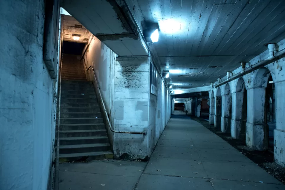 Dark tunnel with staircase